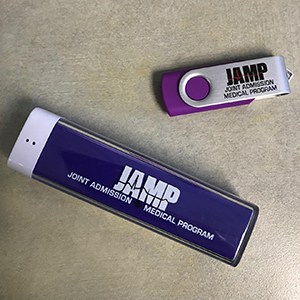 Branded purple USB drive and power bank