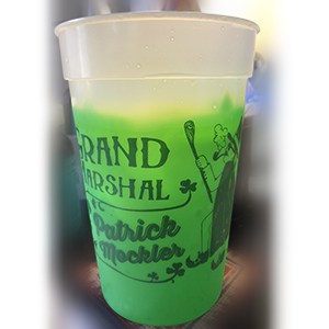 White and green plastic mood cup 