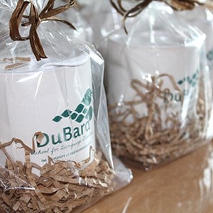 Cork Bottom Ceramic Mugs in bags. 