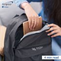 Hand placing a notebook in a branded backpack.