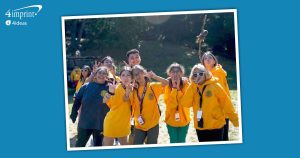 Happy people in yellow shirts.