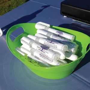 Basket of hand sanitizer giveaways.