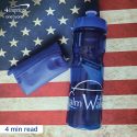 Branded blue water bottle on an American flag background.