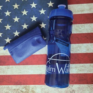 Branded blue water bottle on an American flag background.