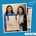 Two Hawai’i Cord Blood Bank staff displaying a branded reusable grocery bag.  3 min read time.
