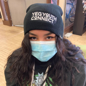 YEG Youth Connect client wearing branded toque