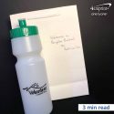 A promotional water bottle and note that says, "Welcome to Brighter Buddies."