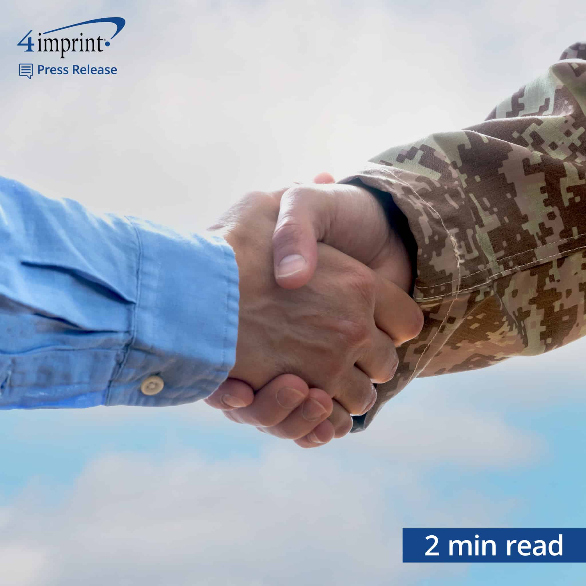 Civilian worker shakes the hand of a veteran. 2 minute read.
