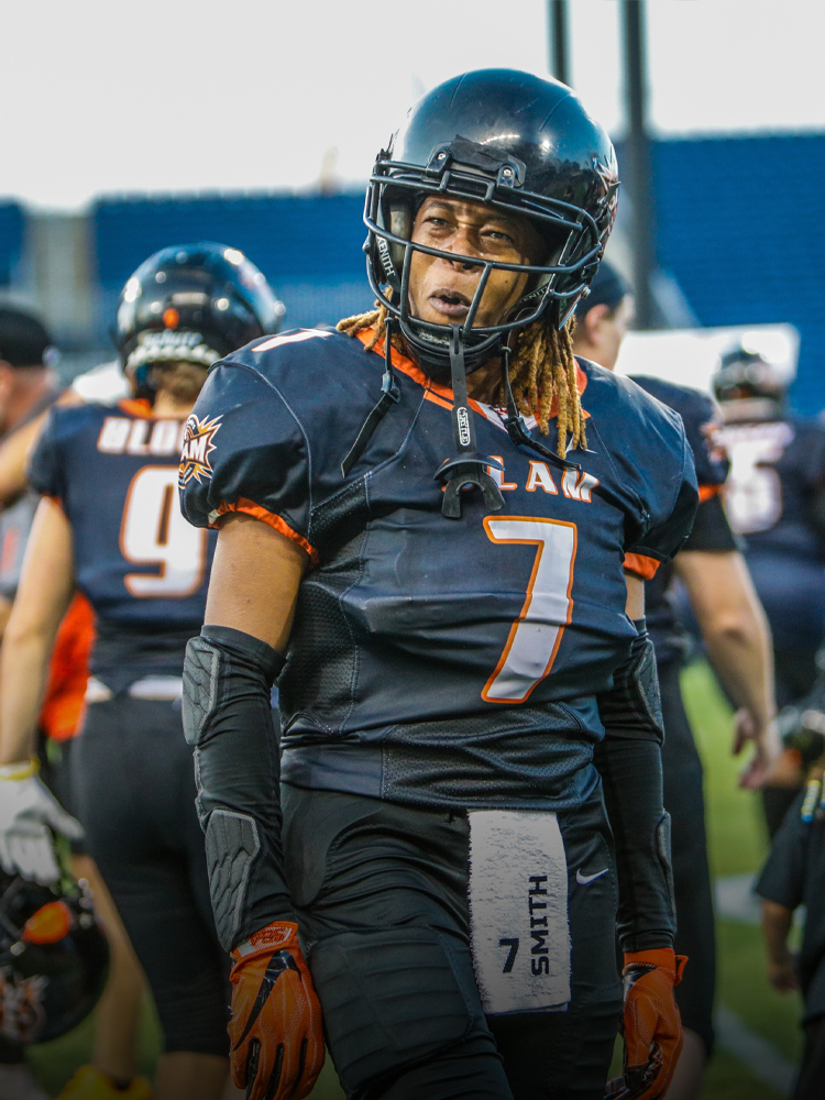 Excited football player after a great play in the championship game - Women's Football Alliance