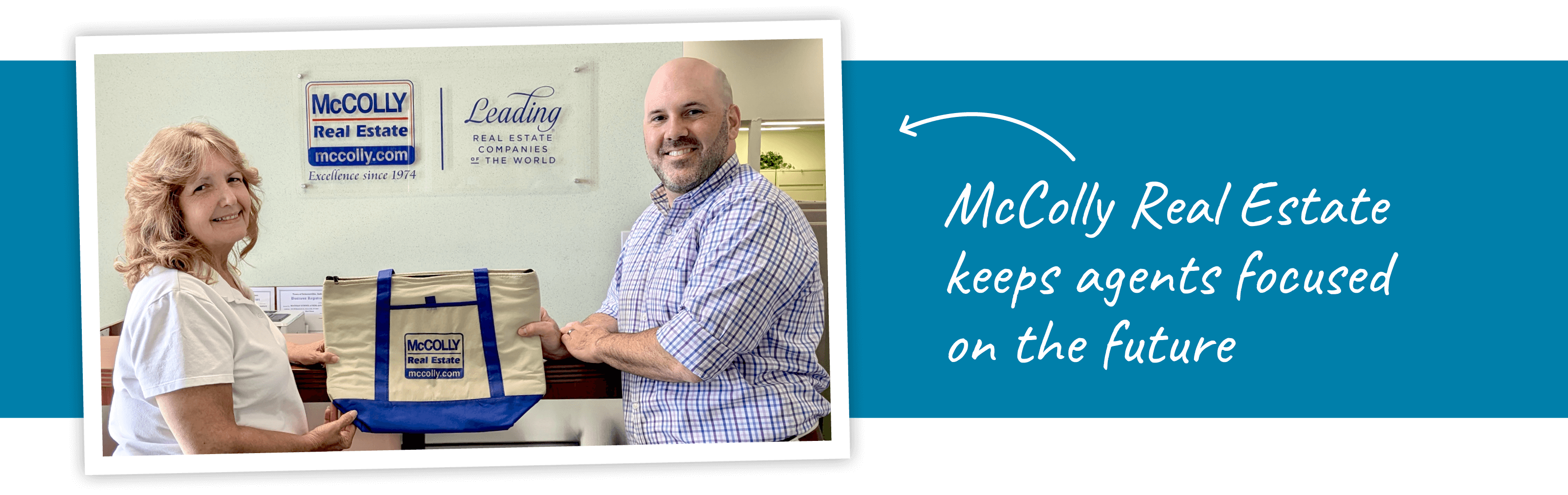 McColly Real Estate keeps agents focused on the future - photo of two employees holding branded tote bag