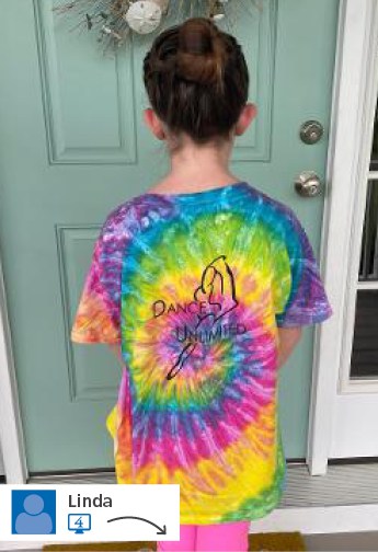 A child in a tie-dye shirt.