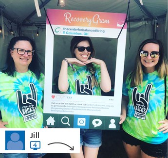 Three women in tie-dye shirts.