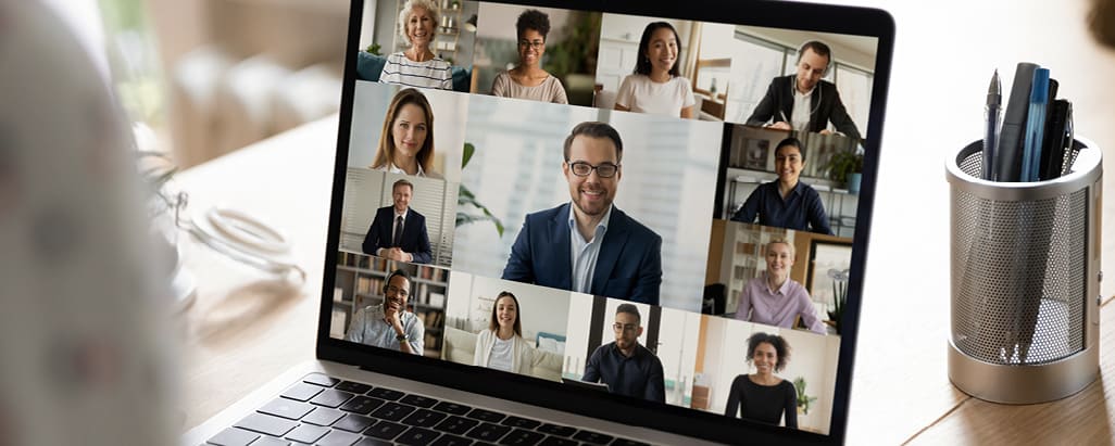 Multiple people on a computer screen.