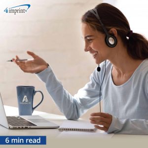 Woman with headphones looking at computer - 6 minute read