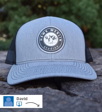 promotional ball cap with raised embroidered circle logo on front