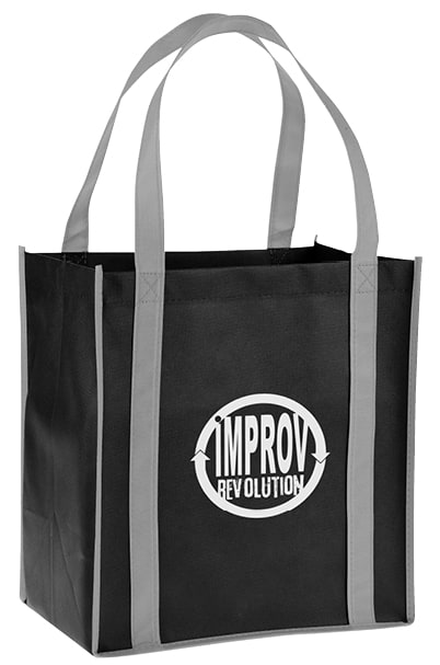 tote bags with Improv Revolution logo on it