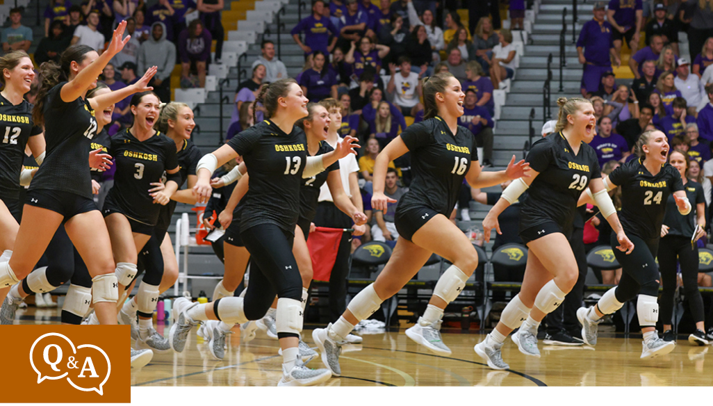 Volleyball players run to celebrate with crowd after big win - start of story Q&A