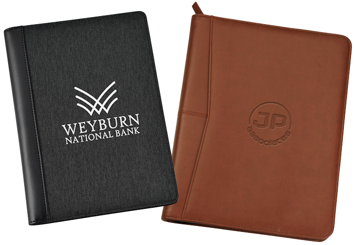 two padfolios with company logos imprinted on covers