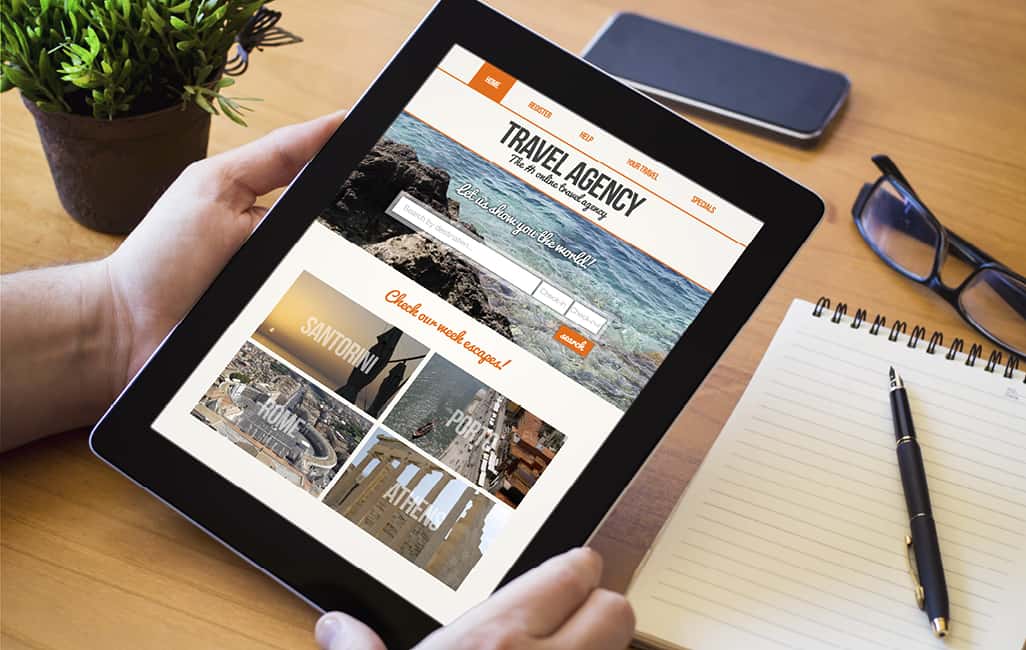 Travel agency website on tablet screen