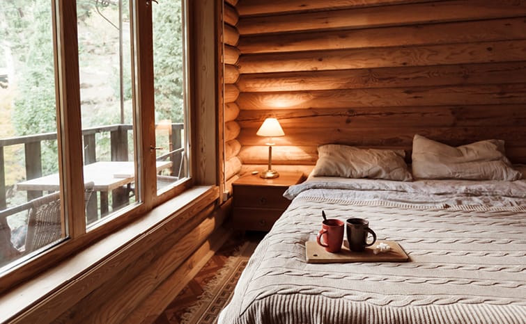 bedroom in log cabin vacation home