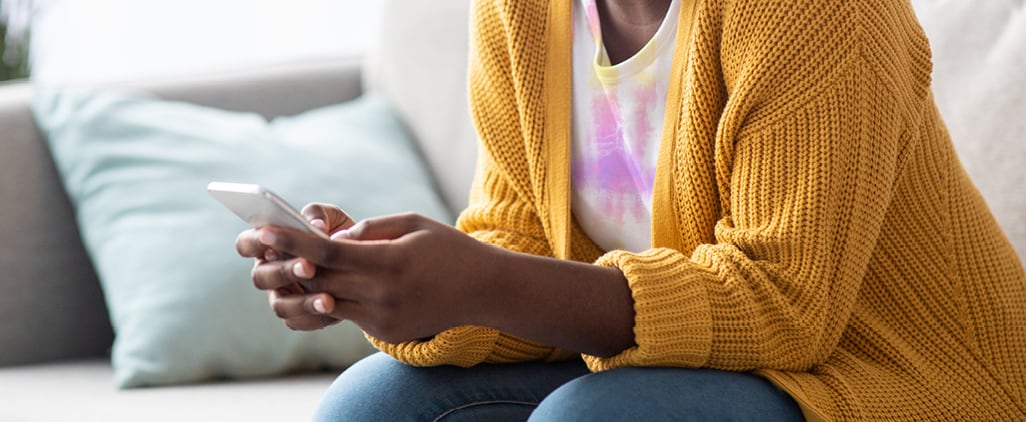 Woman holding a smartphone in her hand