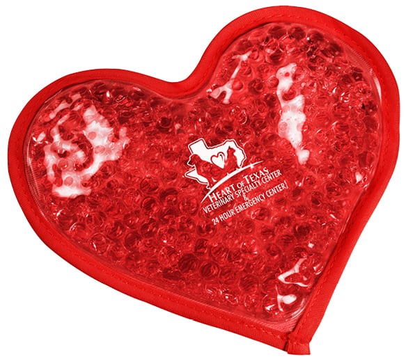 Plush, heart-shaped hot/cold pack with a logo.