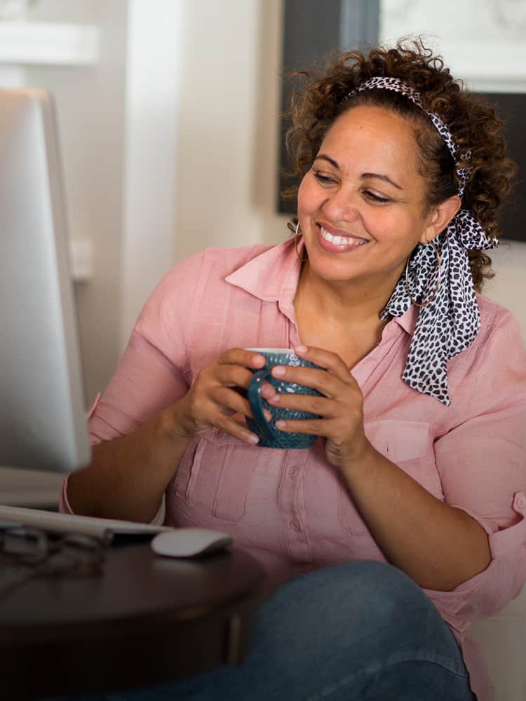 African-American woman working at computer