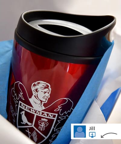 branded travel tumbler in a gift bag