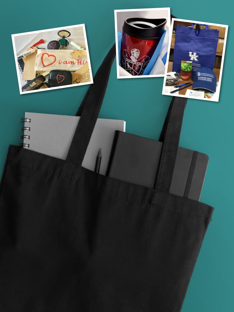 Black tote with promotional items inside