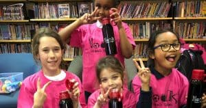 The Nook Children’s Program gives kids a sense of community with water bottle giveaways.