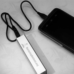 Phone connected to a portable USB charger