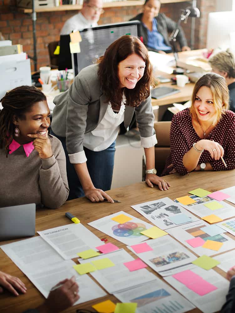 A team of women working on a project together