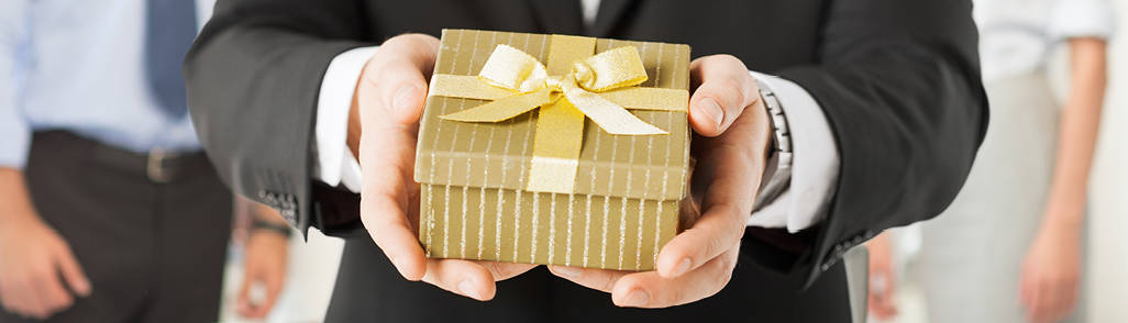 Person holding wrapped present