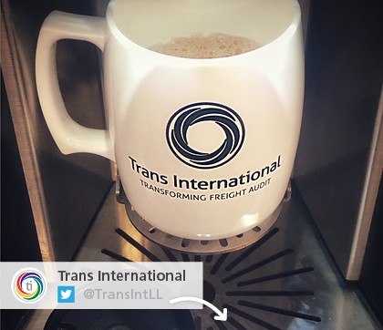 A picture from Twitter of a promotional mug that says Trans International
