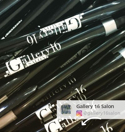 Gallery 16 Salon Instagram photo showing a pile of all their unique promotional pens
