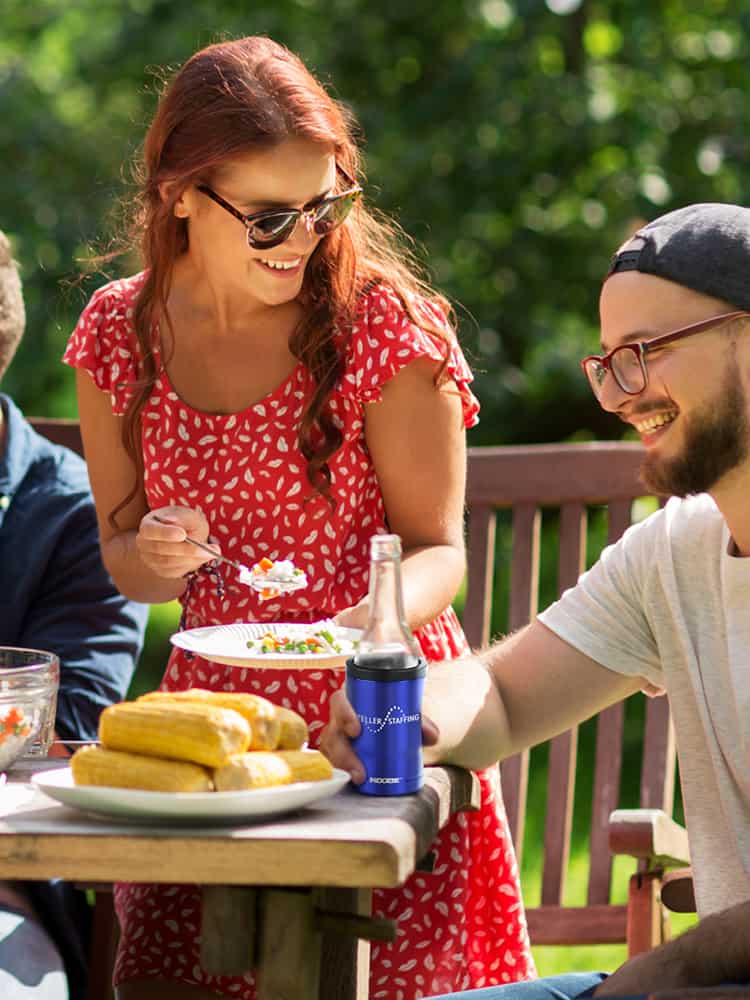 People enjoying an outdoor picnic during the summer time