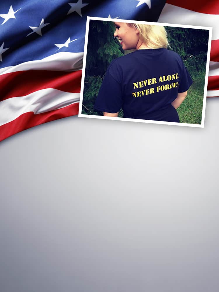 Woman wearing branded t-shirt for Operation Not Alone.