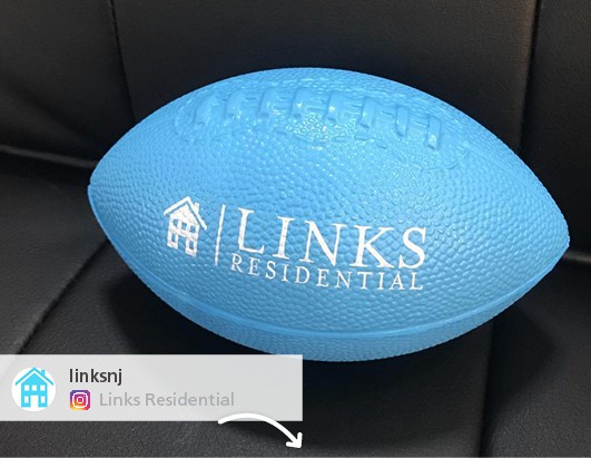 Customer posted picture of a promotional football purchased from 4imprint.