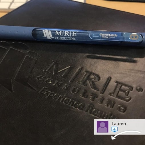 A social media post showing a promotional pen and joural.