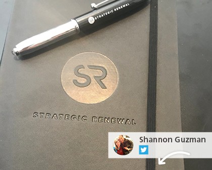 Social media post showing a logoed pen and journal.