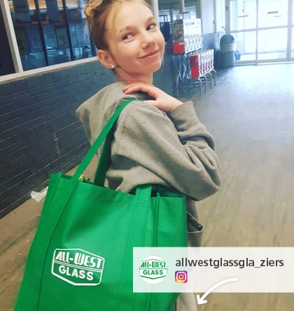 Instagram post with a girl holding a promotional bag
