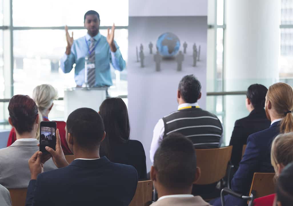 A man speaks to a crowd.