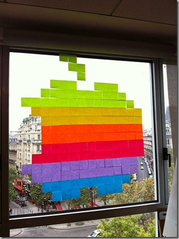 An Apple computers logo made of Post-its.